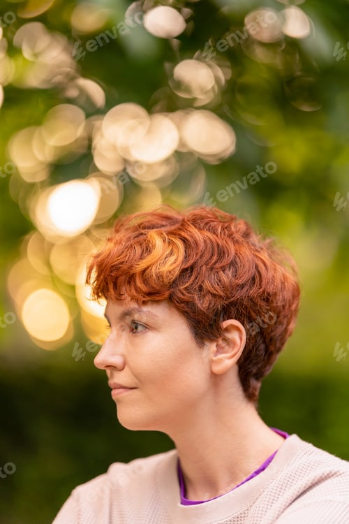 Preview: Calm non binary person on summer day in nature