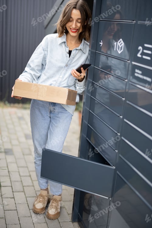 Preview: Caucasian woman with parcel near post terminal