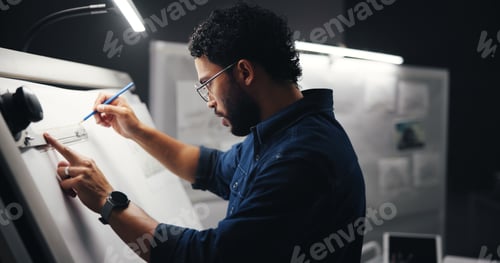 Preview: Drawing, creative and man artist in studio at night with deadline for animation illustration. Board