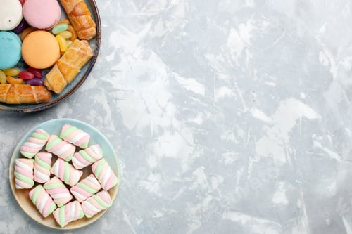 Preview: top view french macarons with bagels and marshmallows on white background sweet biscuit pie sugar