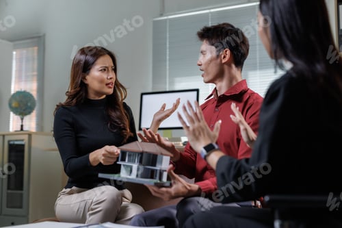 Preview: Couple arguing over house model with real estate agent