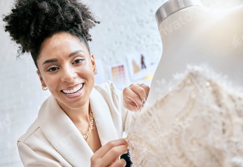 Preview: Fashion, designer and smile with mannequin and black woman in workshop for planning, manufacturing