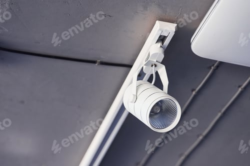 Preview: Interior of modern kitchen with light bulbs hanging indoors at daytime