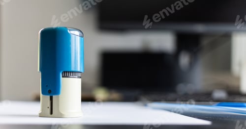 Preview: blue stamp on a white paper