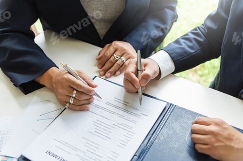 Preview: Signing a business contract. Group of business people at the meeting and sign a together