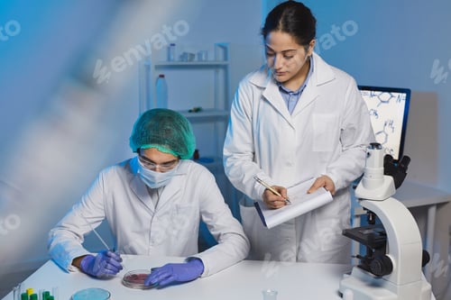 Preview: Clinical researchers working in laboratory