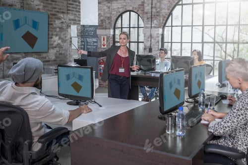Preview: Adult Education, students receiving lesson at computer training centre