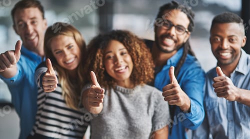 Preview: Portrait of a group of creative businesspeople giving thumbs up while standing in their office