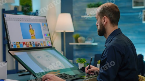 Preview: Photography artist editing photos with graphic tablet and stylus