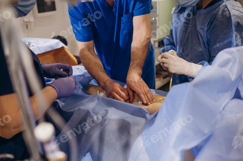 Preview: the doctor glues a plaster after the operation