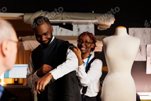 Preview: Tailor Fitting Suit in Fashion Design Studio