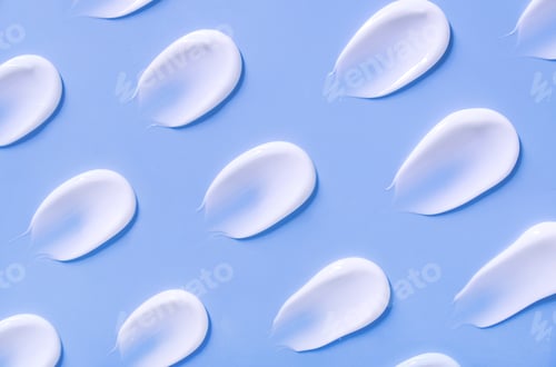 Preview: cosmetic smears cream texture on pastel background