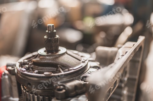 Preview: Closeup of an oily scrap machine used in a factory