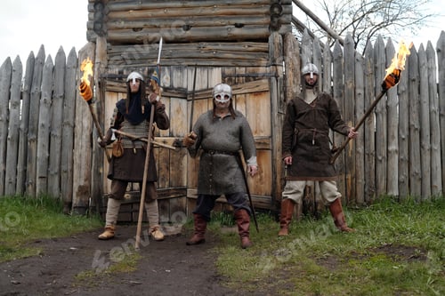 Preview: Reenacting Medieval Knights with Flaming Torches Outside Fort