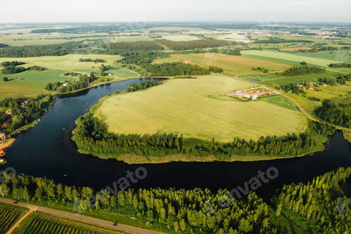 Preview: Lake in a green field in the form of a horseshoe in the Mogilev region.Belarus.The nature of Belarus
