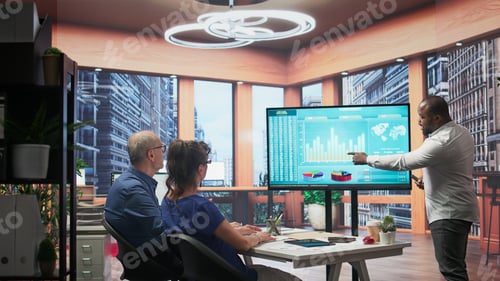 Preview: Senior couple reading pension plan contract terms with advisor