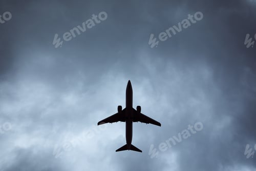 Preview: Silhouette of airplane in storm