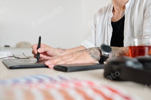 Preview: Graphic designer using on tablet