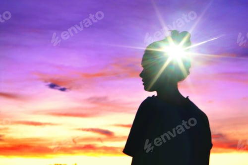 Preview: Mental health Female at sunset with bright light on head, healing thoughts hope recovery positive