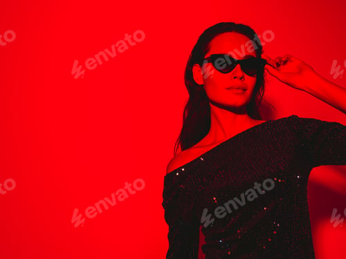 Preview: Young fashion woman posing in studio