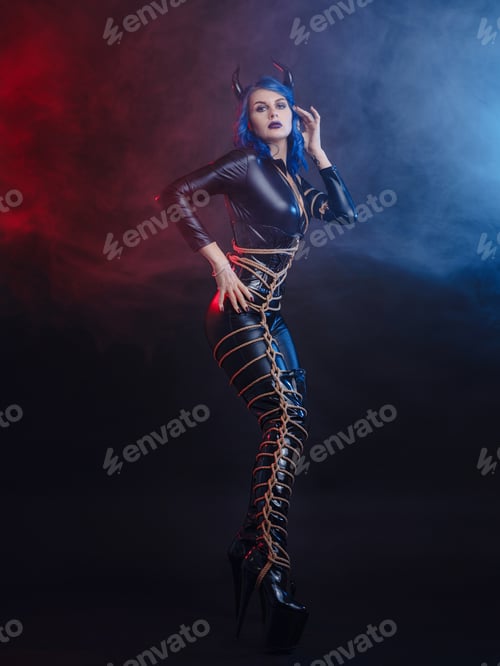Preview: happy halloween, woman in devil costume