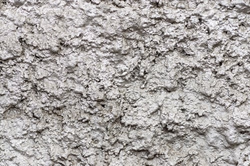 Preview: Big Bumpy Texture Of A Rough Shapeless Surface Of A Wall Of Silvery Color For Empty Abstract
