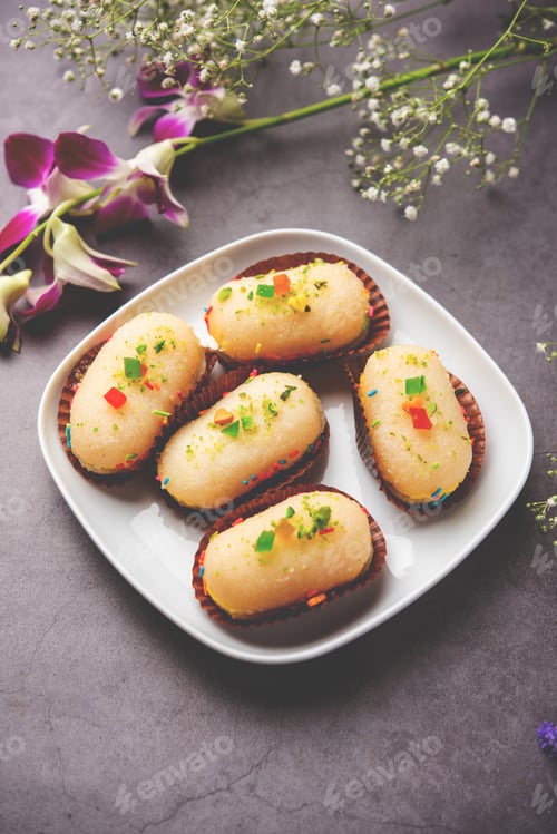 Preview: Malai Chop or Cream sandwich made using filling Rasgulla or Gulab jamun sweet is a Bengali sweet