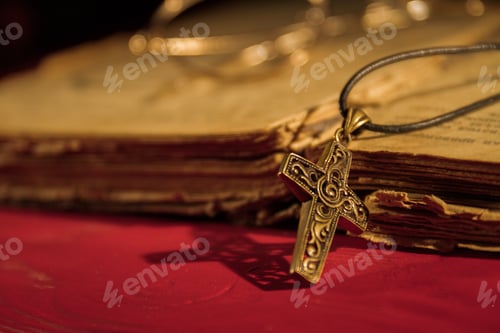 Preview: Cropper Christian cross necklace on Holy Bible.