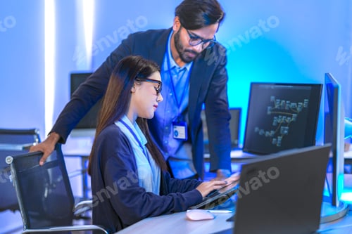 Preview: Senior engineer mentoring a junior female developer