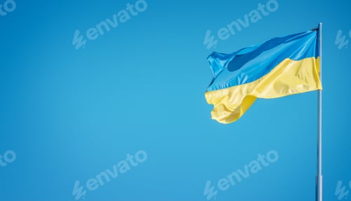 Preview: Ukraine flag large national symbol fluttering in blue sky.