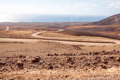 Preview: Deserted landscape with ground road on Fuerteventura island