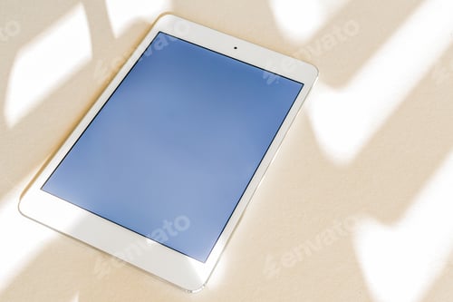 Preview: Tablet with blue screen on a desk - copy space, technology concept
