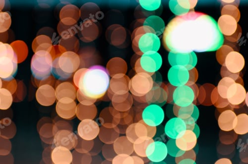 Preview: Colorful orange and green bokeh defocused on background