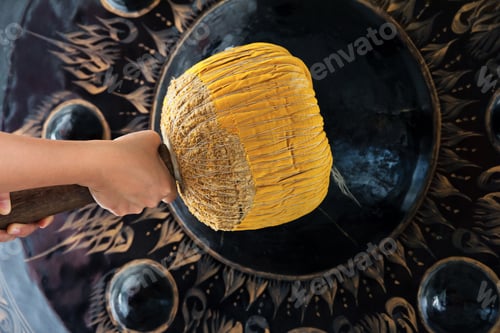 Preview: Hand hit big gong in temple