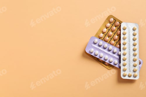 Preview: Blisters of contraceptive pills on beige background, top view. Space for text