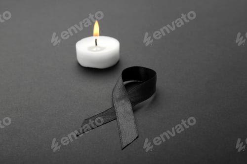 Preview: Ribbon and candle on black background. Funeral symbols