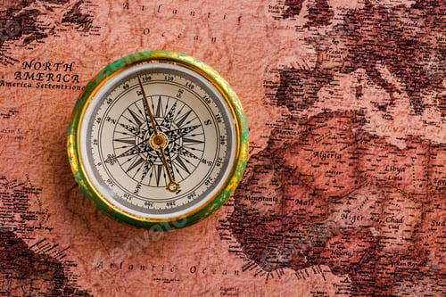 Preview: top view of golden compass near map