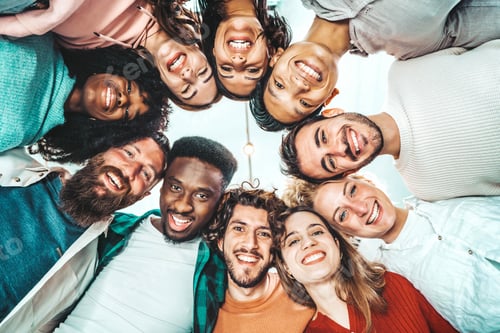 Preview: Portrait close up picture of happy faces young friends standing in circle and looking at camera