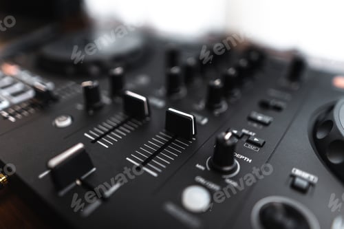 Preview: Close-up dj controller and Sound mixing desk at home