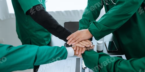 Preview: Team Doctors nurses union coordinate hands Teamwork Concept in hospital for
