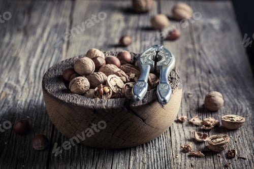 Preview: Delicious various nuts with on rustic wooden table