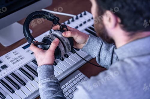 Preview: Music Composer with Headphones in the Studio
