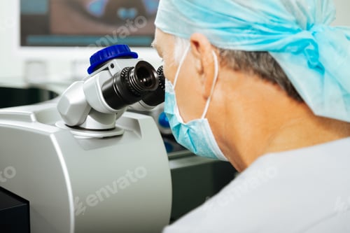 Preview: Professional hard working doctor looking into the lens