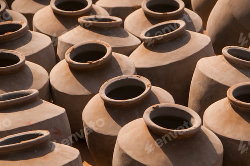 Preview: Many earthen pots stacked together
