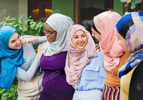 Preview: Smiling Women Chatting Outside Wearing Headscarves