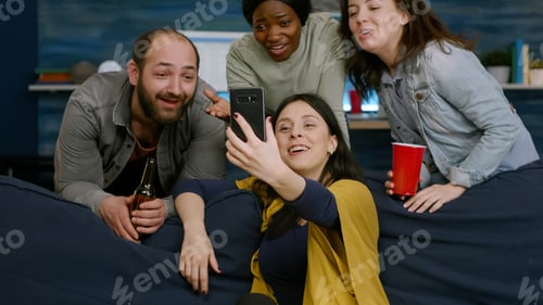 Preview: Group of multiracial friends having online videocall meeting using mobile