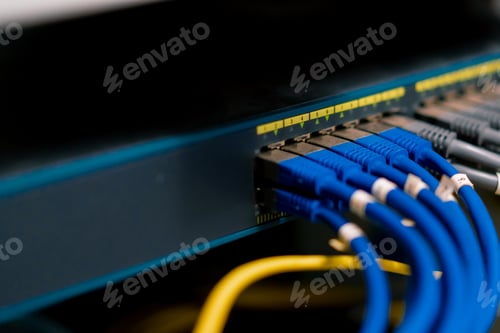 Preview: a bunch of patch network cables sorted in a rack cabinet leading from a patch panel in a server rack
