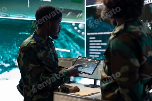Preview: Team of diverse troopers examining satellite CCTV footage on a tablet