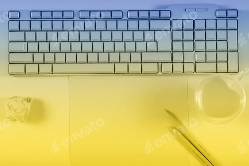 Preview: A Bright Computer Keyboard Stands On The Table