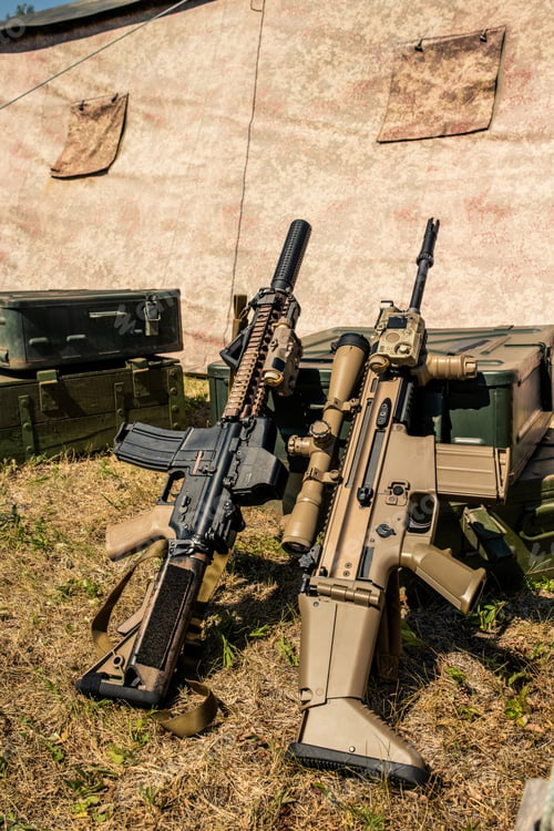 Preview: Rifles leaning on suitcase
